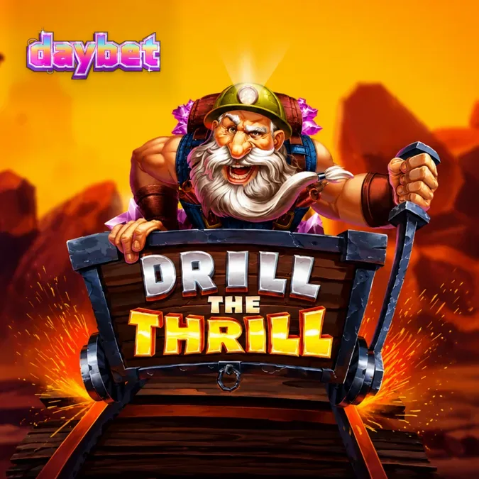 Isang masayahing minero na may hawak na drill sa loob ng isang minahan sa slot na Drill the Thrill.